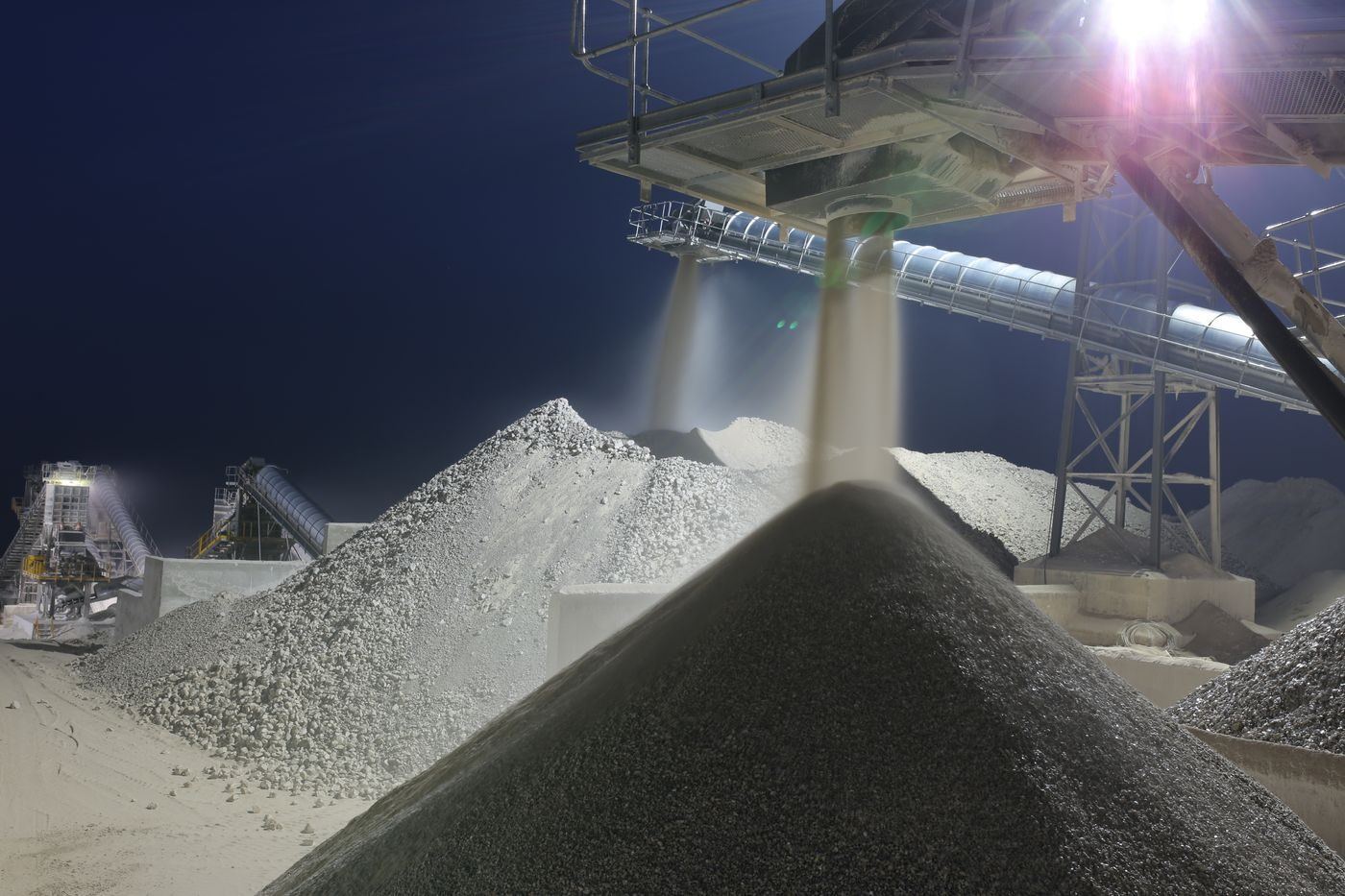 Shovel in a pile of crushed stone aggregate