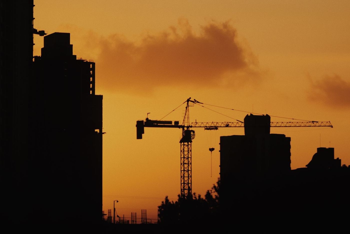Construction skyline at sunset