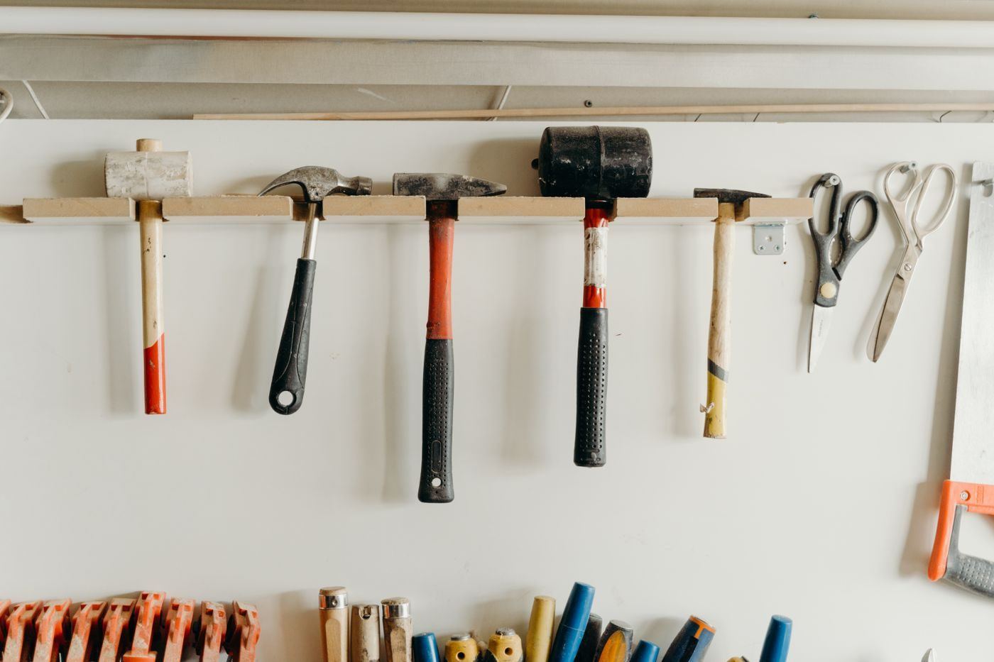 Hand tools displayed on the shop wall